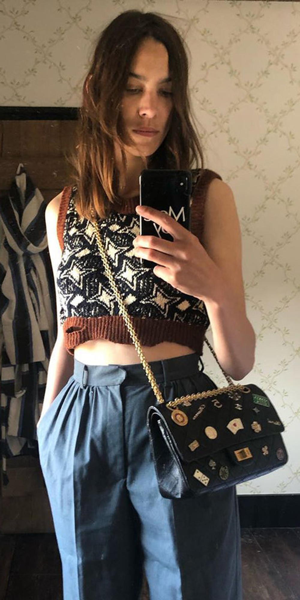 Alexa Chung flaunts an adorable cropped knit vest | About Her