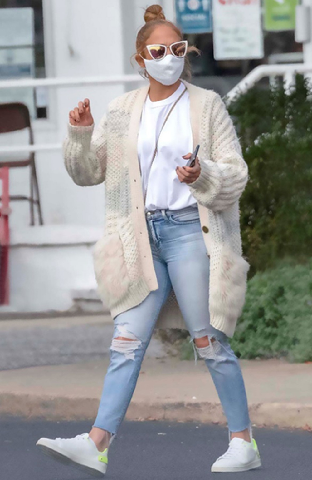 Jennifer Lopez in a cozy Coach cardigan | About Her